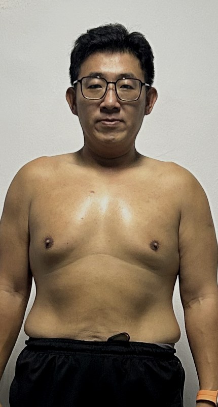 Colin after training, leaner with visible midsection definition